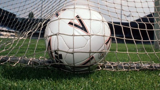 High-scoring action in primary school football competition