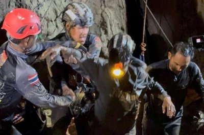 One Laotian miner rescued from cave after nine days