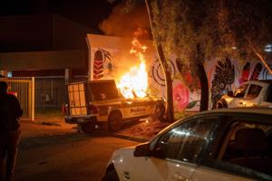 An angry crowd riots outside Australian hospital treating suspect in 5-year-old girl's death