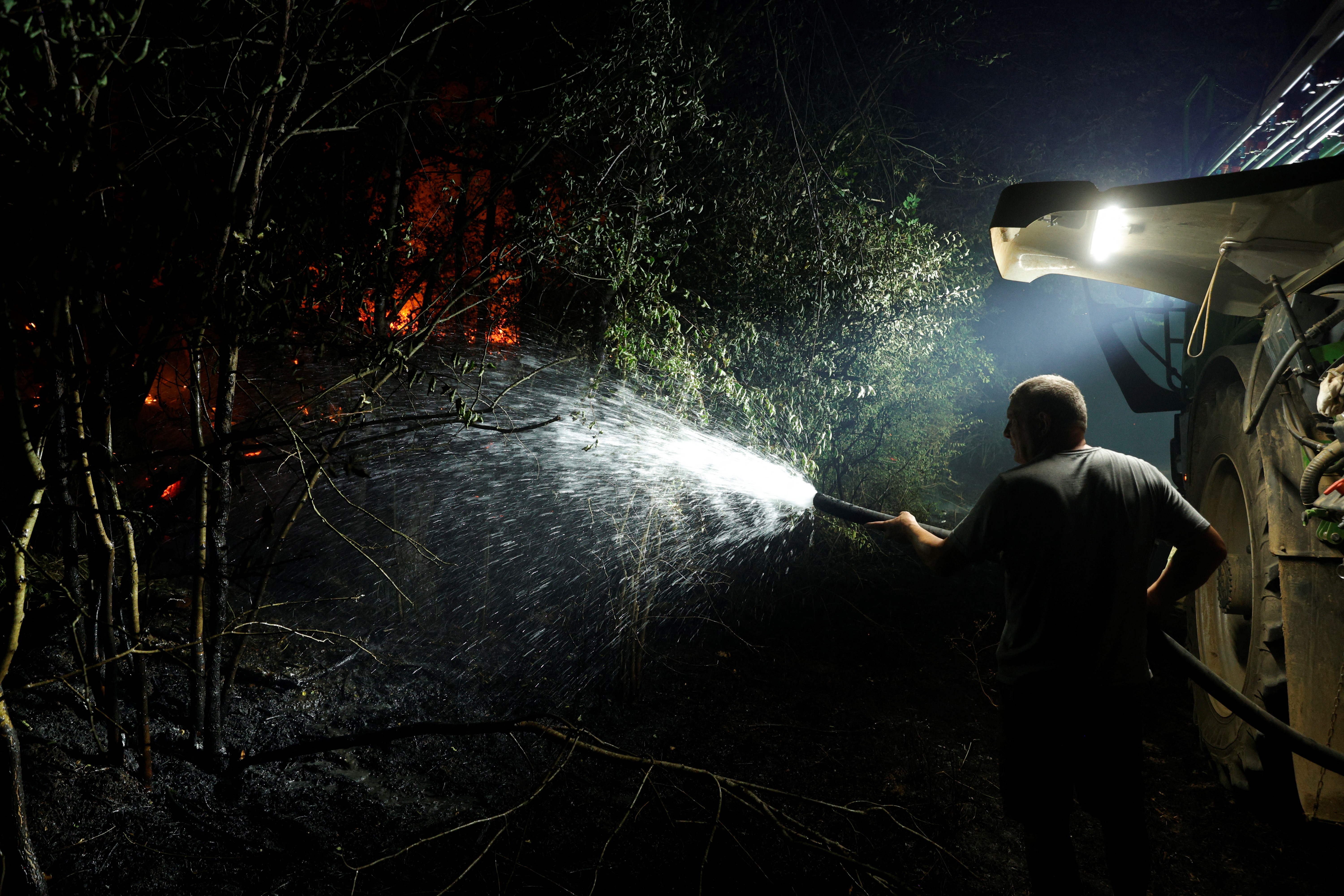 Large wildfire south of Paris may have been deliberately set, says France’s interior minister